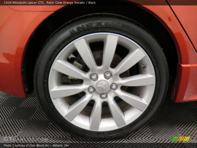 Rotor Glow Orange Metallic / Black 2009 Mitsubishi Lancer GTS