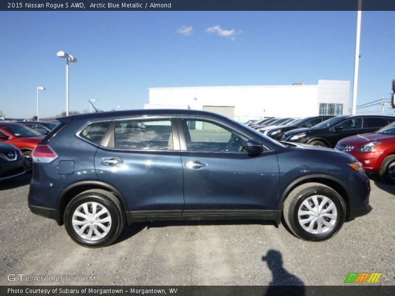 Arctic Blue Metallic / Almond 2015 Nissan Rogue S AWD