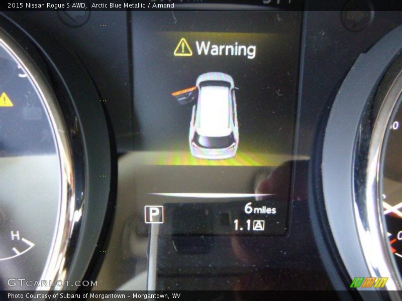 Arctic Blue Metallic / Almond 2015 Nissan Rogue S AWD