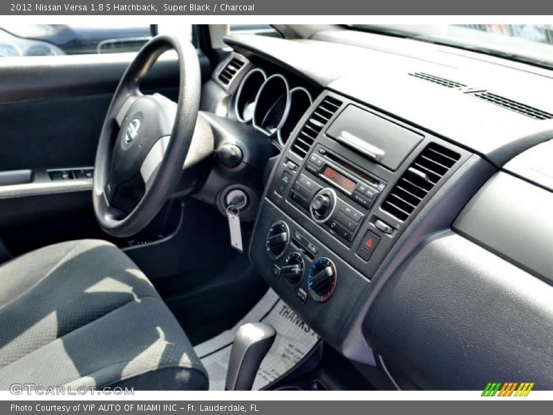 Super Black / Charcoal 2012 Nissan Versa 1.8 S Hatchback