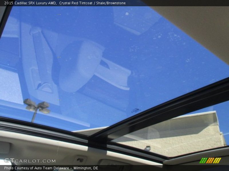 Crystal Red Tintcoat / Shale/Brownstone 2015 Cadillac SRX Luxury AWD