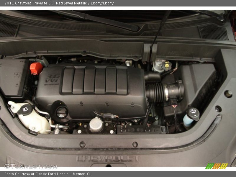 Red Jewel Metallic / Ebony/Ebony 2011 Chevrolet Traverse LT
