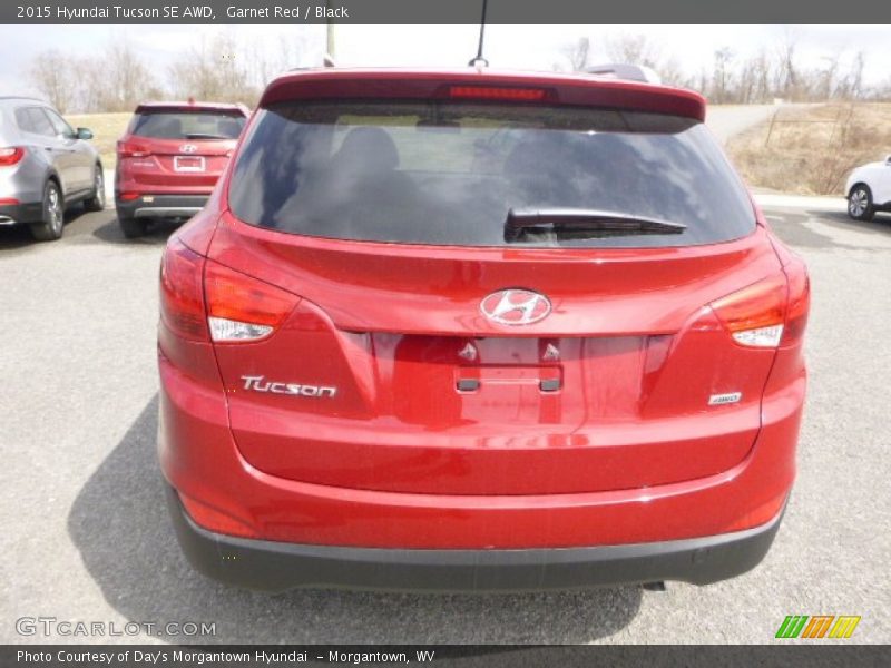 Garnet Red / Black 2015 Hyundai Tucson SE AWD