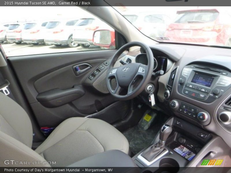 Garnet Red / Black 2015 Hyundai Tucson SE AWD
