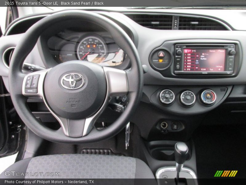 Dashboard of 2015 Yaris 5-Door LE