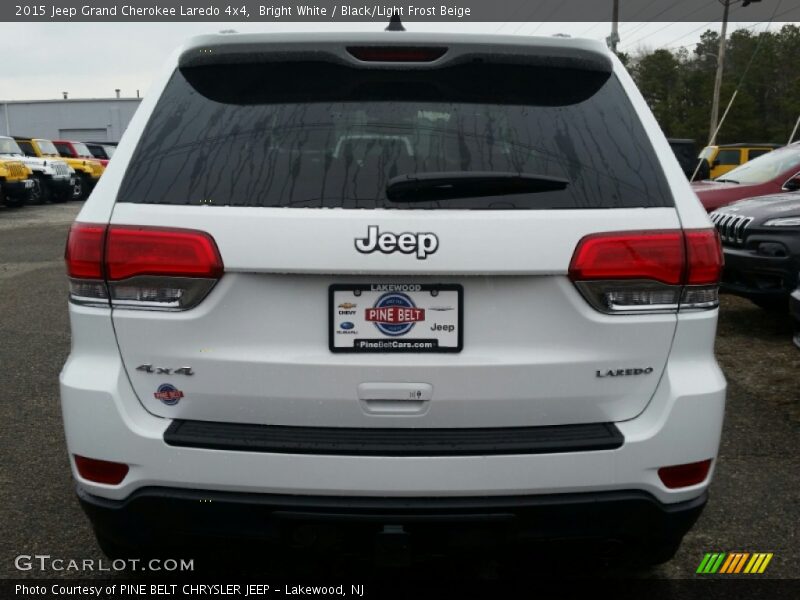 Bright White / Black/Light Frost Beige 2015 Jeep Grand Cherokee Laredo 4x4