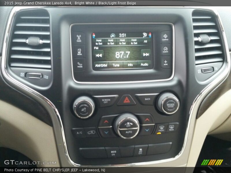 Bright White / Black/Light Frost Beige 2015 Jeep Grand Cherokee Laredo 4x4