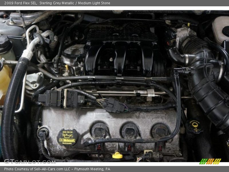 Sterling Grey Metallic / Medium Light Stone 2009 Ford Flex SEL