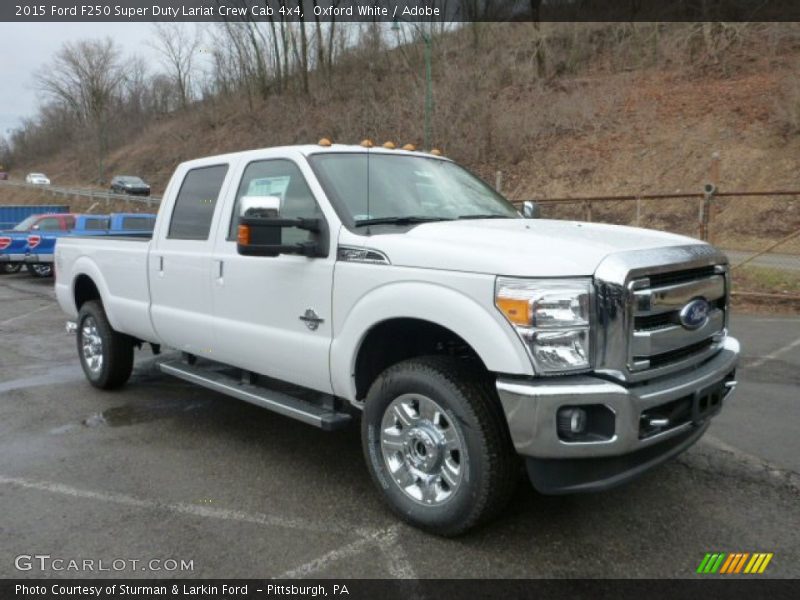 Front 3/4 View of 2015 F250 Super Duty Lariat Crew Cab 4x4