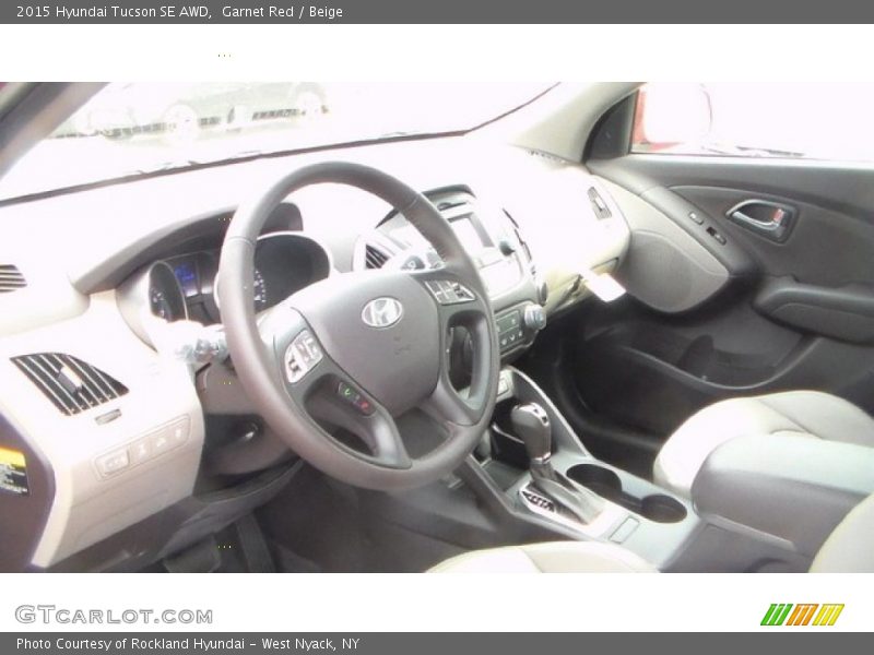 Garnet Red / Beige 2015 Hyundai Tucson SE AWD
