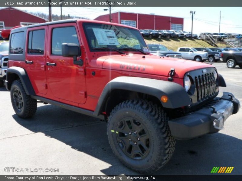 Firecracker Red / Black 2015 Jeep Wrangler Unlimited Willys Wheeler 4x4