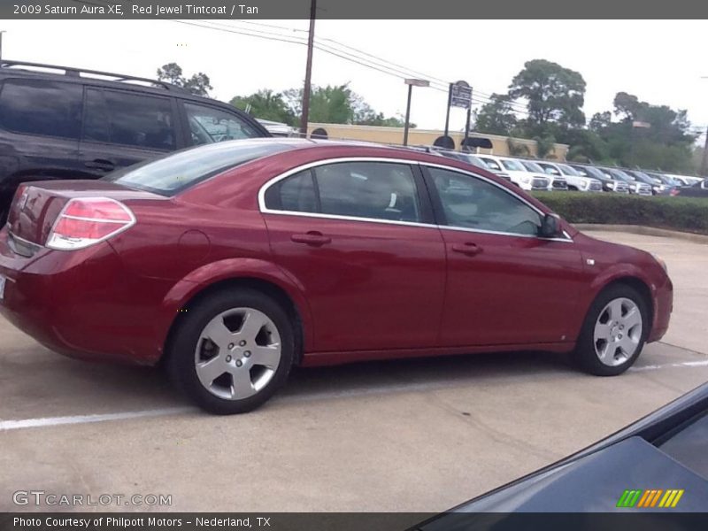 Red Jewel Tintcoat / Tan 2009 Saturn Aura XE