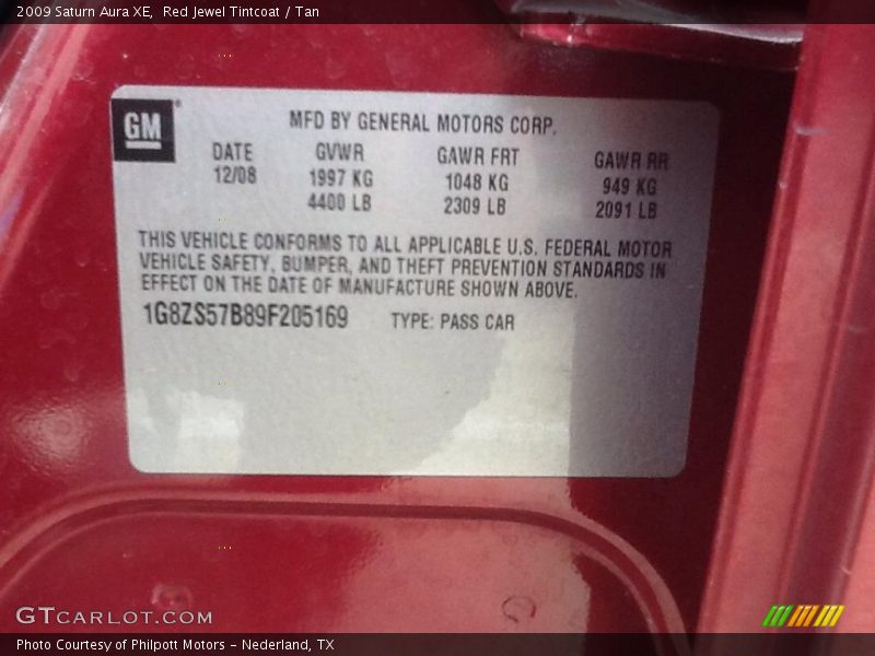 Red Jewel Tintcoat / Tan 2009 Saturn Aura XE