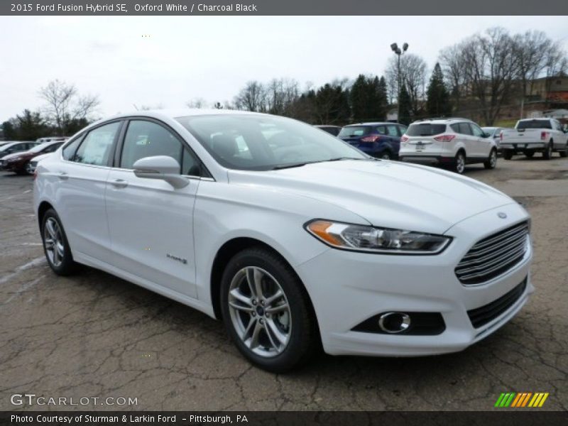 Front 3/4 View of 2015 Fusion Hybrid SE