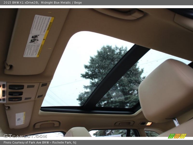 Midnight Blue Metallic / Beige 2015 BMW X1 xDrive28i