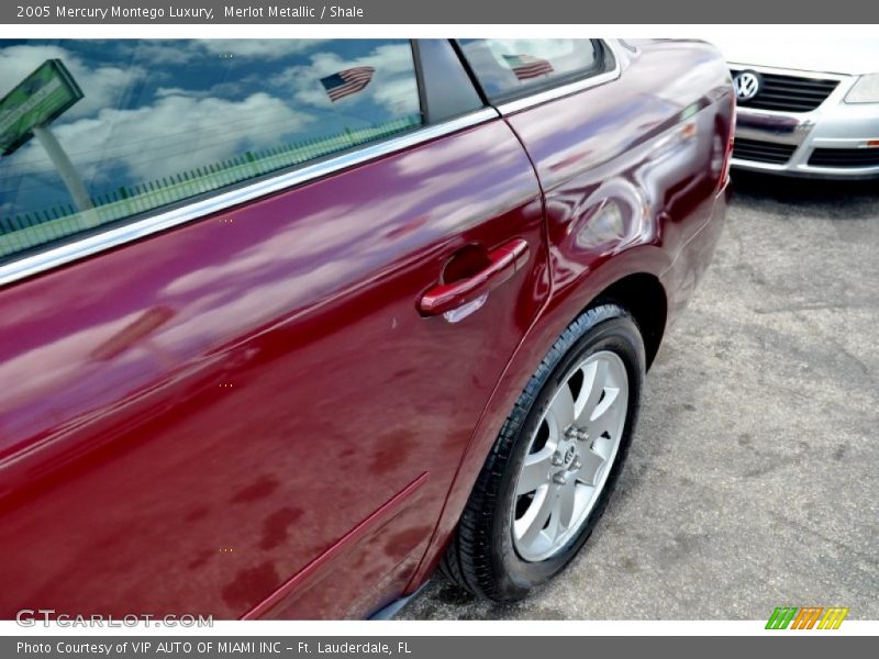 Merlot Metallic / Shale 2005 Mercury Montego Luxury
