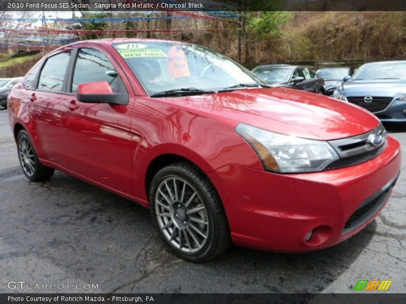 Sangria Red Metallic / Charcoal Black 2010 Ford Focus SES Sedan
