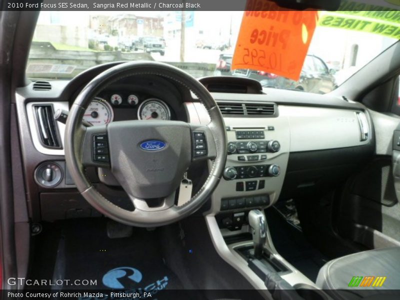 Sangria Red Metallic / Charcoal Black 2010 Ford Focus SES Sedan