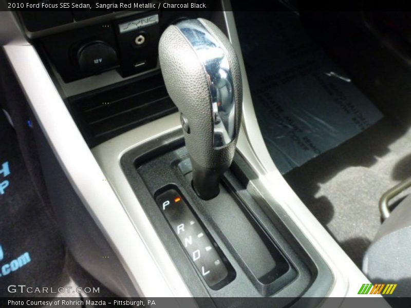 Sangria Red Metallic / Charcoal Black 2010 Ford Focus SES Sedan