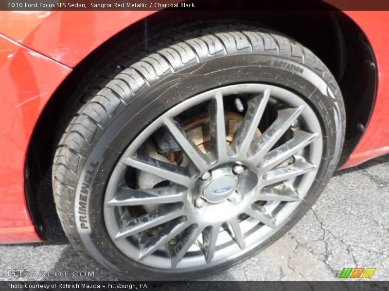 Sangria Red Metallic / Charcoal Black 2010 Ford Focus SES Sedan