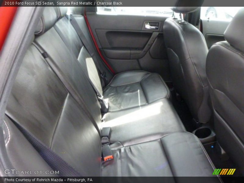 Sangria Red Metallic / Charcoal Black 2010 Ford Focus SES Sedan