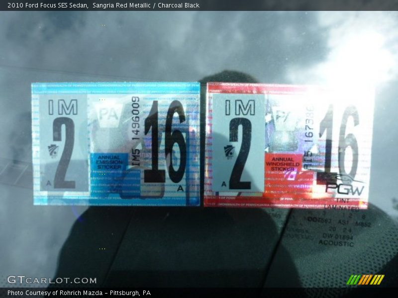 Sangria Red Metallic / Charcoal Black 2010 Ford Focus SES Sedan