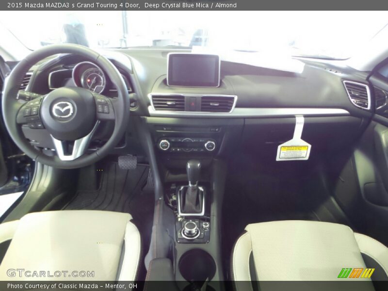 Deep Crystal Blue Mica / Almond 2015 Mazda MAZDA3 s Grand Touring 4 Door