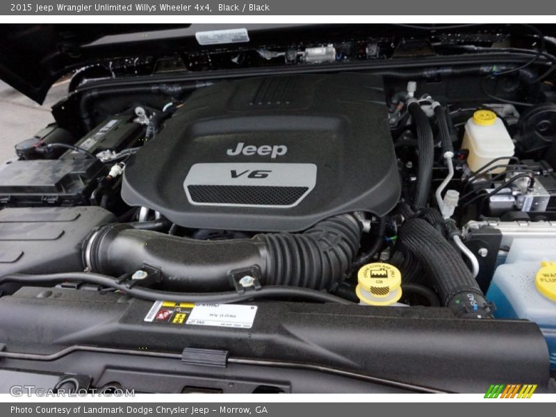 Black / Black 2015 Jeep Wrangler Unlimited Willys Wheeler 4x4