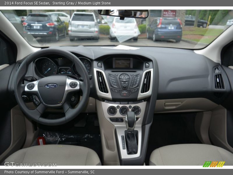 Sterling Gray / Medium Light Stone 2014 Ford Focus SE Sedan