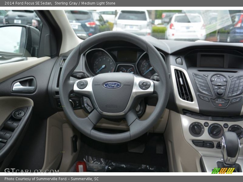 Sterling Gray / Medium Light Stone 2014 Ford Focus SE Sedan