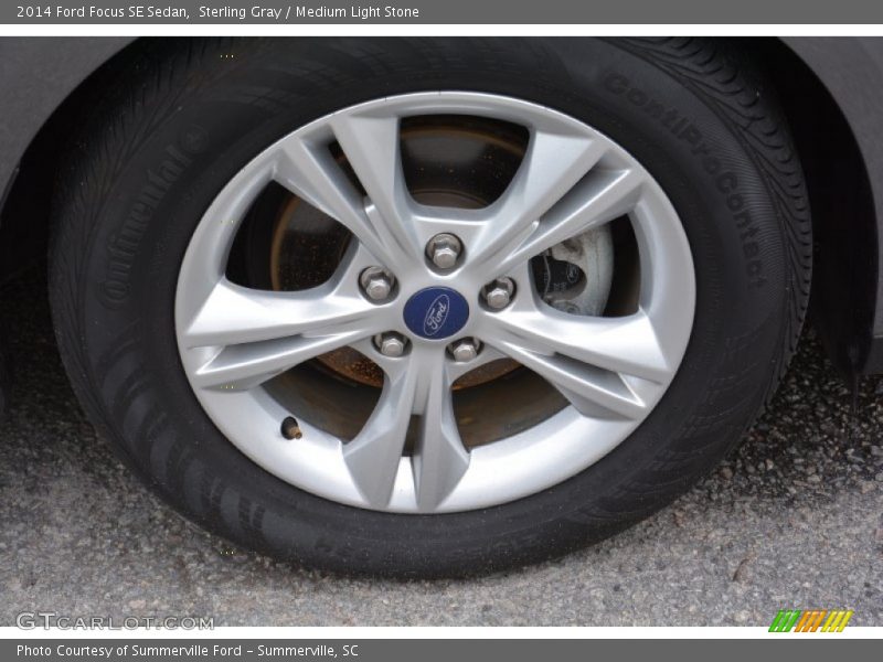 Sterling Gray / Medium Light Stone 2014 Ford Focus SE Sedan