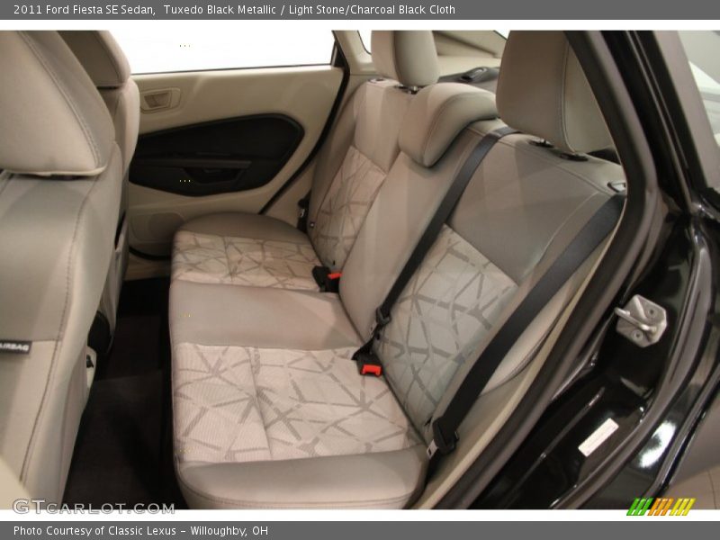 Tuxedo Black Metallic / Light Stone/Charcoal Black Cloth 2011 Ford Fiesta SE Sedan