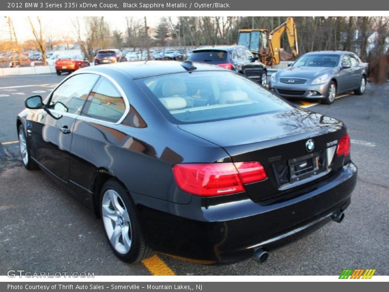 Black Sapphire Metallic / Oyster/Black 2012 BMW 3 Series 335i xDrive Coupe