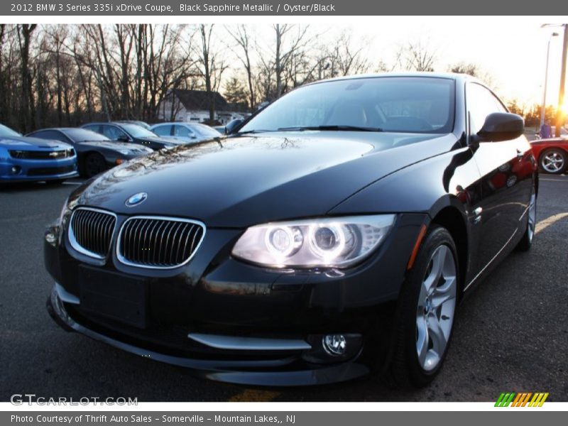 Black Sapphire Metallic / Oyster/Black 2012 BMW 3 Series 335i xDrive Coupe