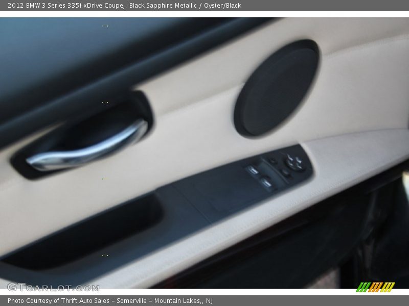 Black Sapphire Metallic / Oyster/Black 2012 BMW 3 Series 335i xDrive Coupe