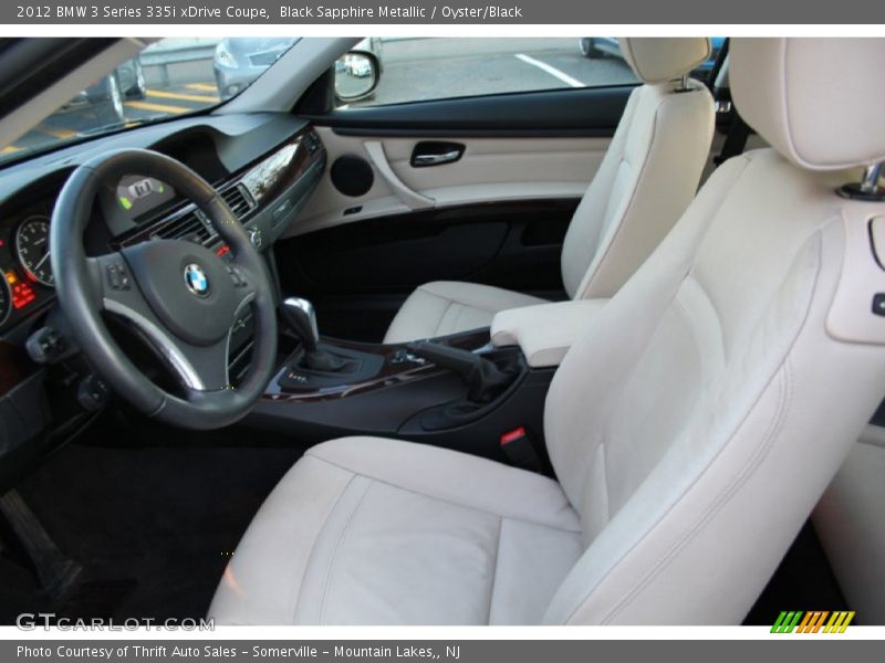 Black Sapphire Metallic / Oyster/Black 2012 BMW 3 Series 335i xDrive Coupe