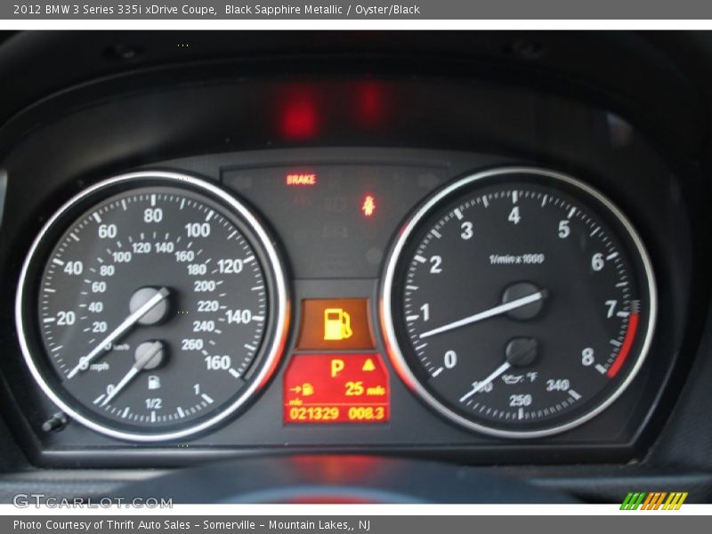 Black Sapphire Metallic / Oyster/Black 2012 BMW 3 Series 335i xDrive Coupe