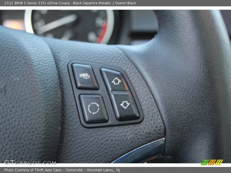 Black Sapphire Metallic / Oyster/Black 2012 BMW 3 Series 335i xDrive Coupe