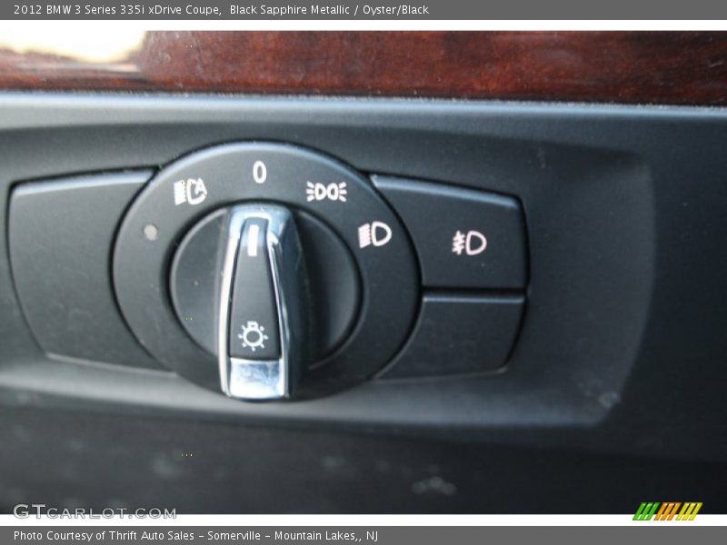 Black Sapphire Metallic / Oyster/Black 2012 BMW 3 Series 335i xDrive Coupe