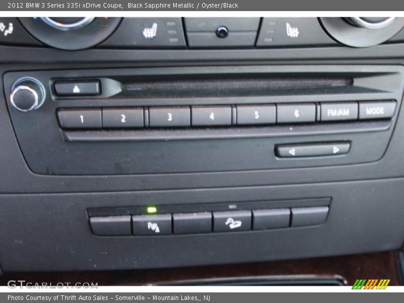 Black Sapphire Metallic / Oyster/Black 2012 BMW 3 Series 335i xDrive Coupe