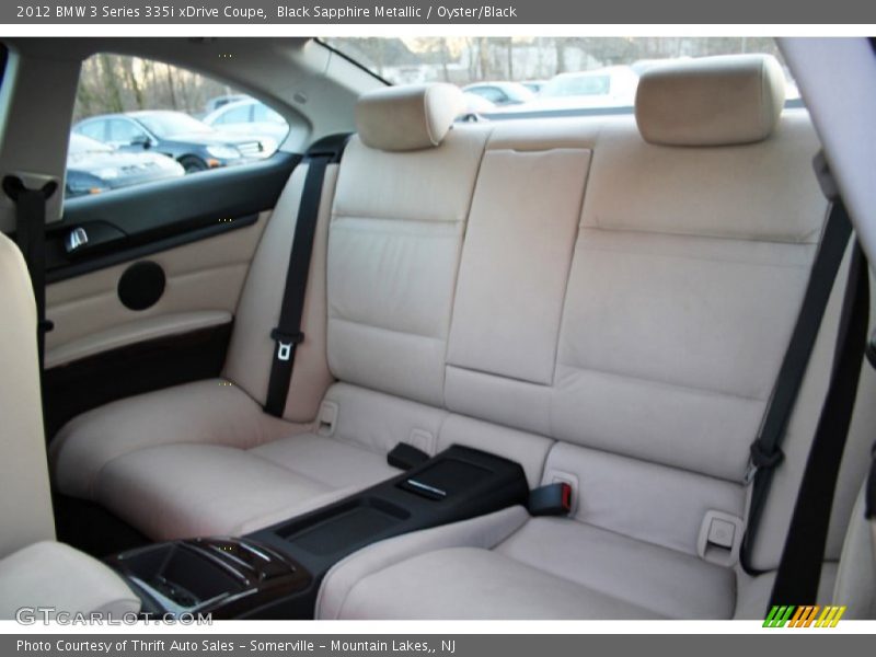 Black Sapphire Metallic / Oyster/Black 2012 BMW 3 Series 335i xDrive Coupe