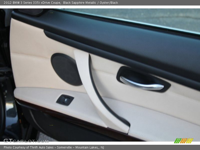 Black Sapphire Metallic / Oyster/Black 2012 BMW 3 Series 335i xDrive Coupe