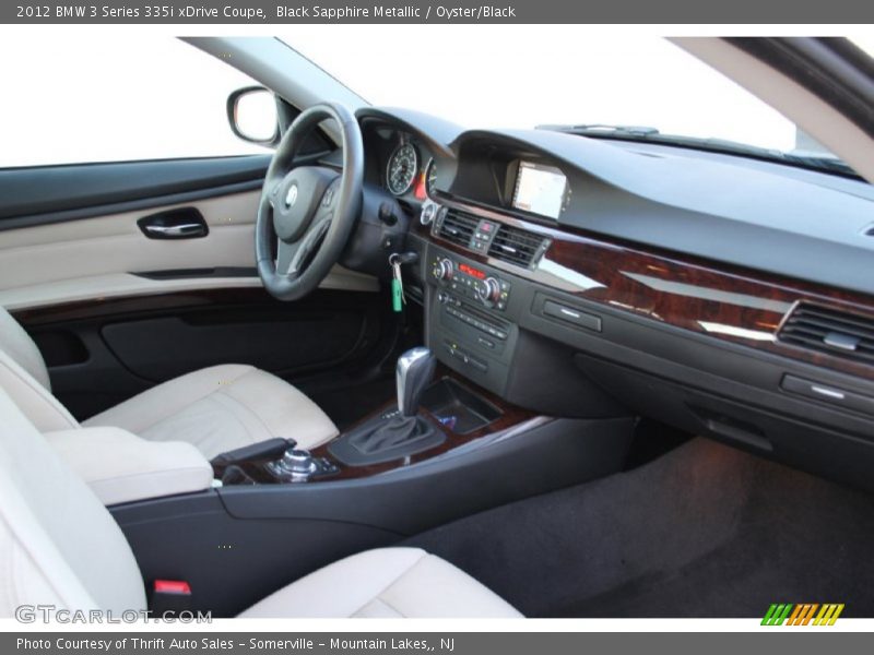 Black Sapphire Metallic / Oyster/Black 2012 BMW 3 Series 335i xDrive Coupe
