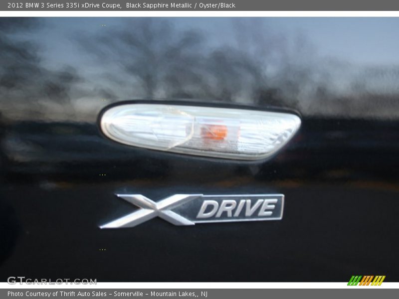 Black Sapphire Metallic / Oyster/Black 2012 BMW 3 Series 335i xDrive Coupe