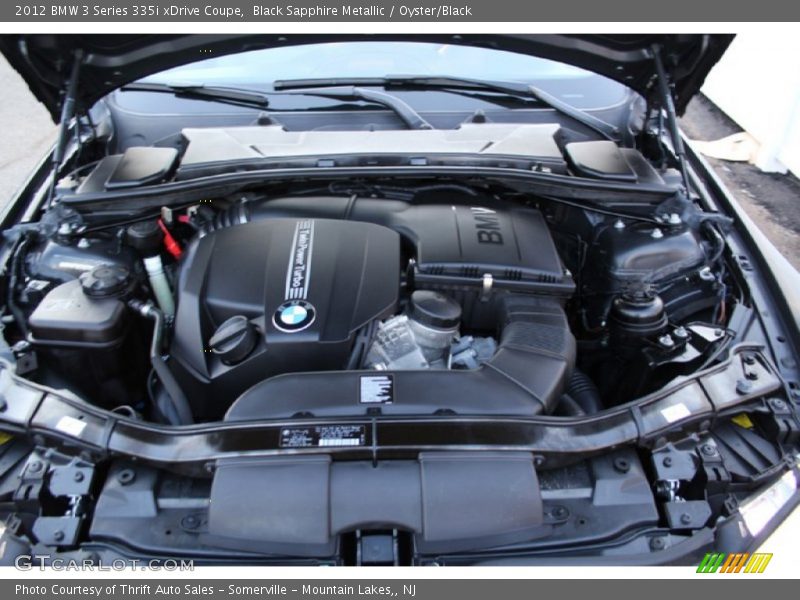 Black Sapphire Metallic / Oyster/Black 2012 BMW 3 Series 335i xDrive Coupe