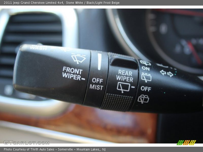 Stone White / Black/Light Frost Beige 2011 Jeep Grand Cherokee Limited 4x4