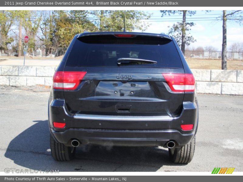 Brilliant Black Crystal Pearl / New Saddle/Black 2011 Jeep Grand Cherokee Overland Summit 4x4