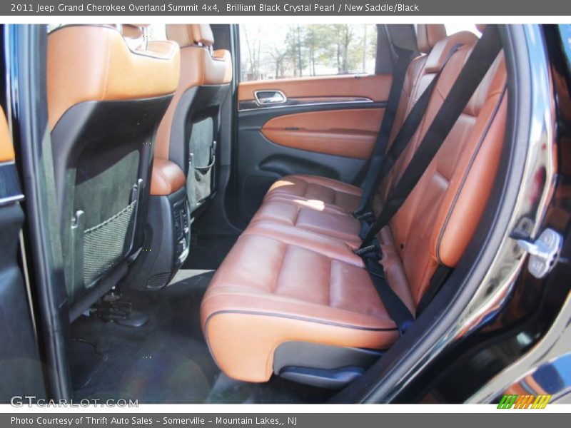 Brilliant Black Crystal Pearl / New Saddle/Black 2011 Jeep Grand Cherokee Overland Summit 4x4