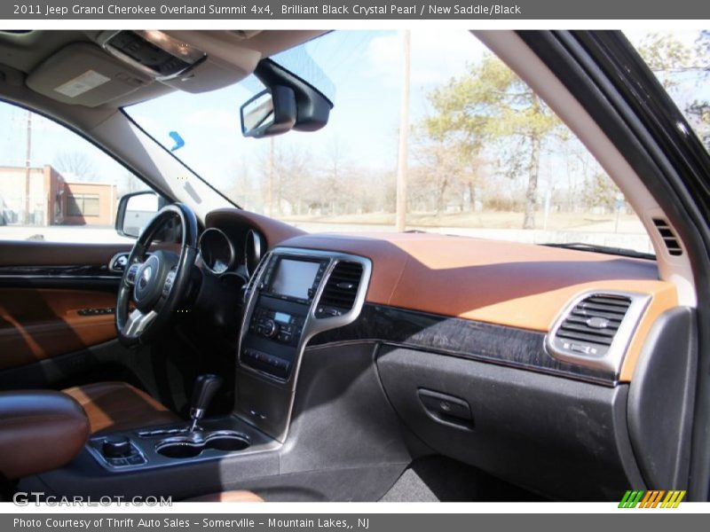 Brilliant Black Crystal Pearl / New Saddle/Black 2011 Jeep Grand Cherokee Overland Summit 4x4