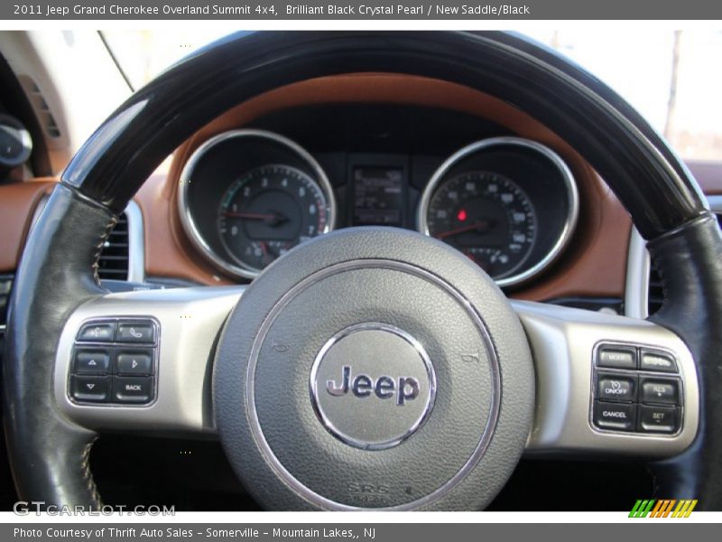 Brilliant Black Crystal Pearl / New Saddle/Black 2011 Jeep Grand Cherokee Overland Summit 4x4